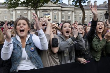 People cheer as President Barack